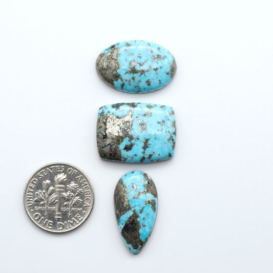 Nacozari turquoise cabochons are striking gemstones known for their vibrant blue to greenish-blue colors and pyrite, these stones are prized in jewelry making.