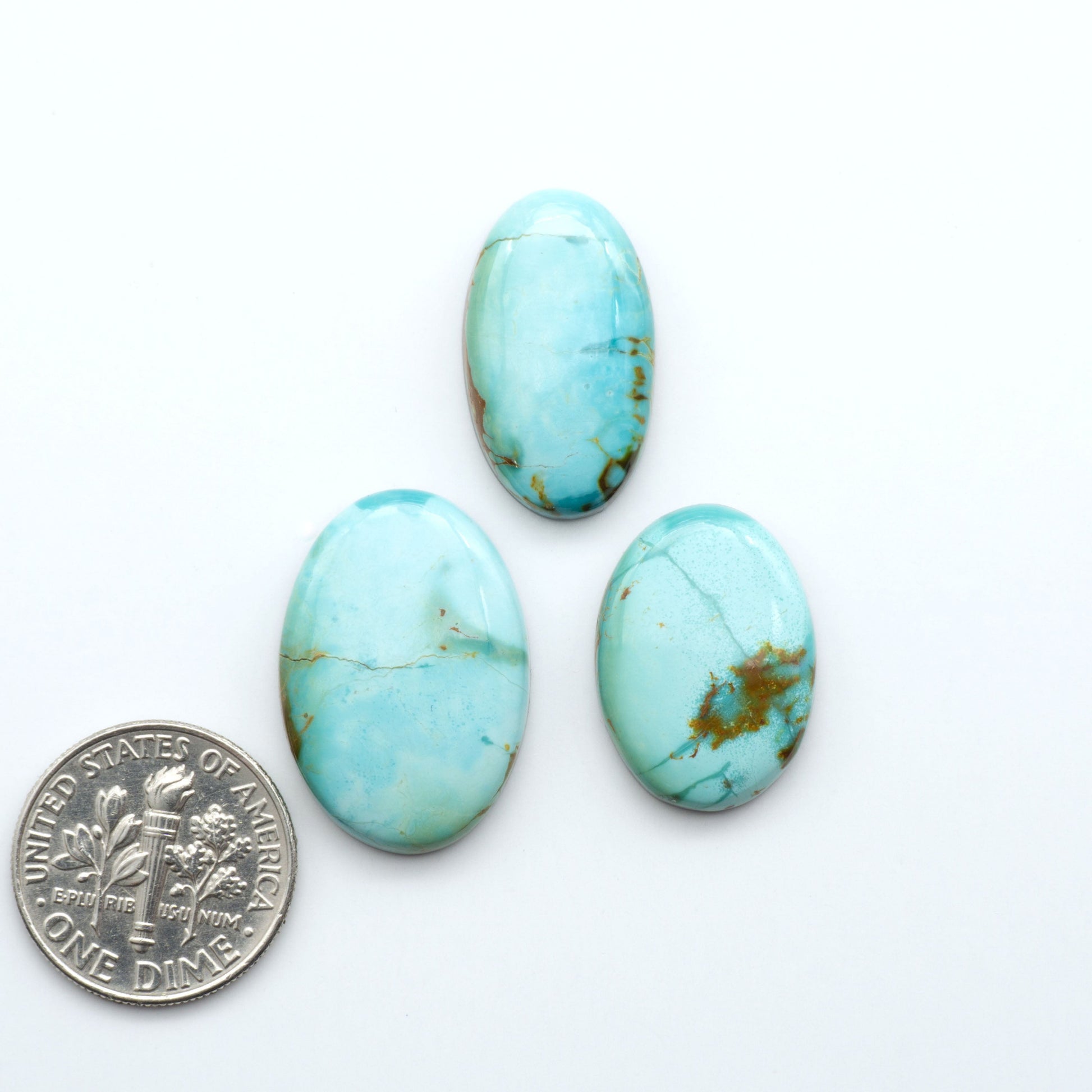 Add a touch of beauty to your collection with our stunning Pilot Mountain Turquoise Cabochons. Perfect for jewelry making each piece is truly one-of-a-kind.