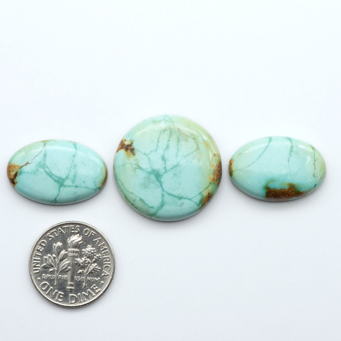 Add a touch of beauty to your collection with our stunning Pilot Mountain Turquoise Cabochons. Perfect for jewelry making each piece is truly one-of-a-kind.