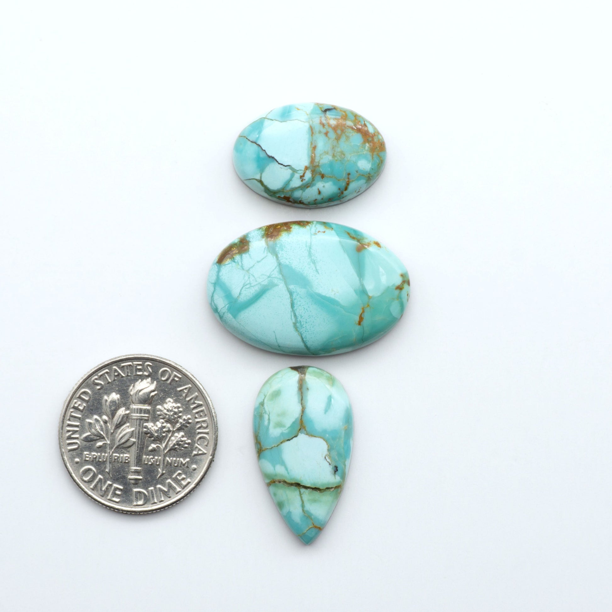 Add a touch of beauty to your collection with our stunning Pilot Mountain Turquoise Cabochons. Perfect for jewelry making each piece is truly one-of-a-kind.