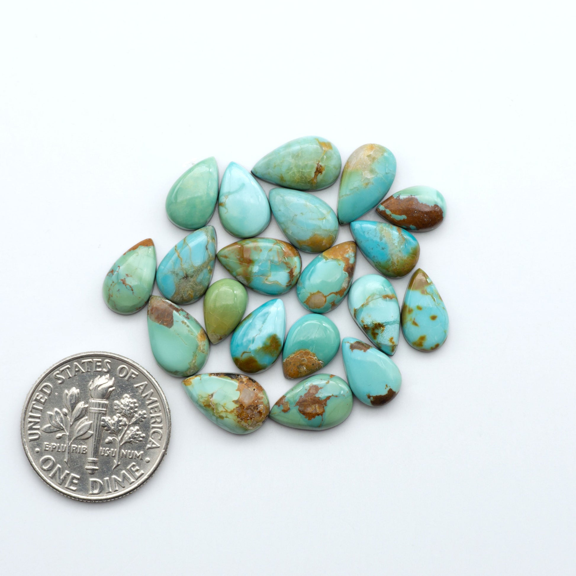 Add a touch of beauty to your collection with our stunning Pilot Mountain Turquoise Cabochons. Perfect for jewelry making each piece is truly one-of-a-kind.