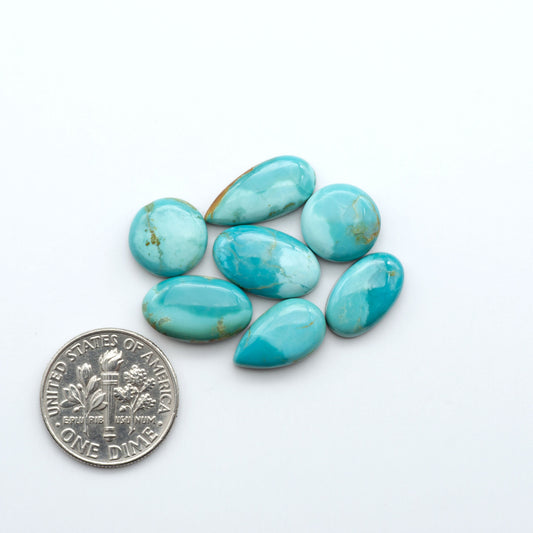 Add a touch of beauty to your collection with our stunning Pilot Mountain Turquoise Cabochons. Perfect for jewelry making each piece is truly one-of-a-kind.