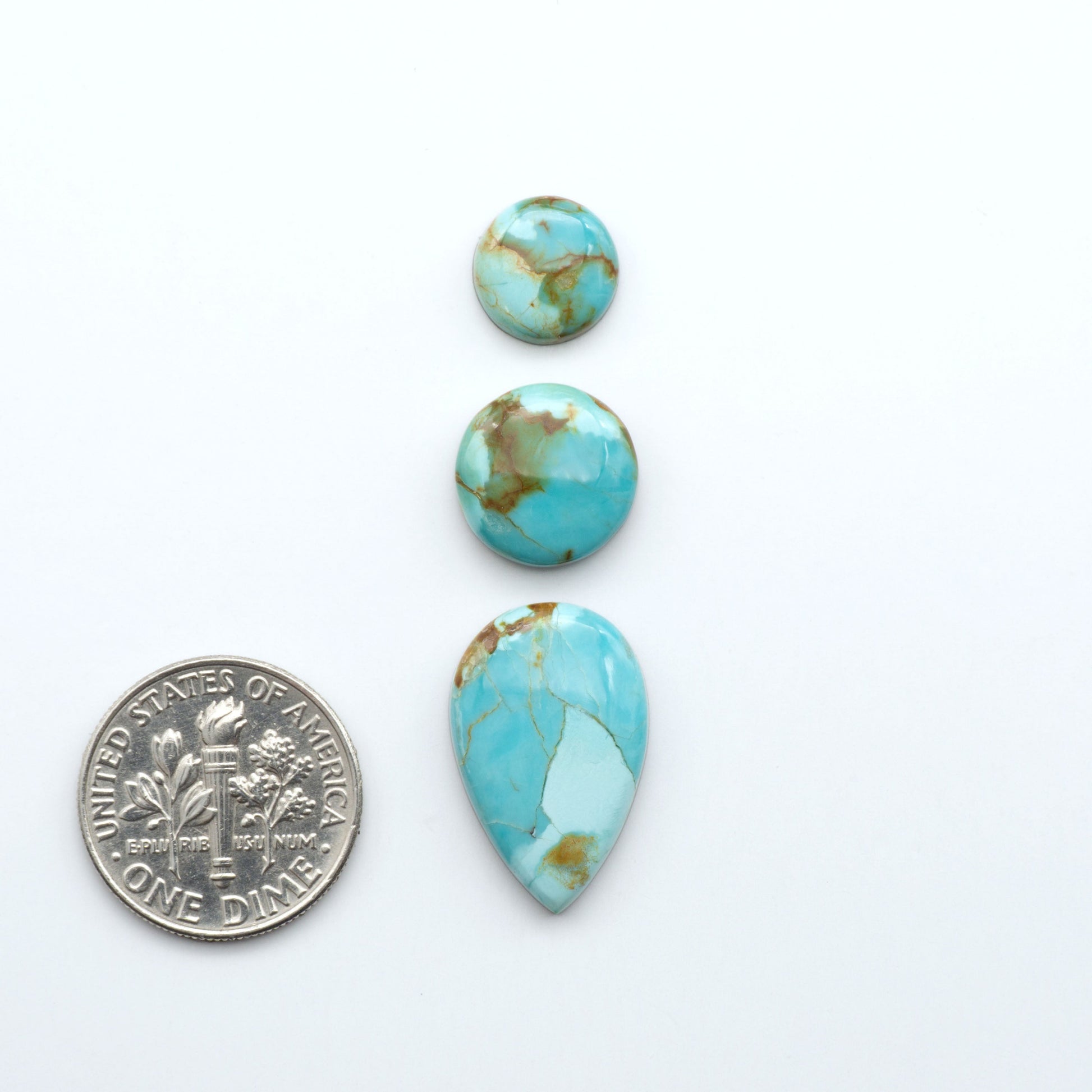 Add a touch of beauty to your collection with our stunning Pilot Mountain Turquoise Cabochons. Perfect for jewelry making each piece is truly one-of-a-kind.