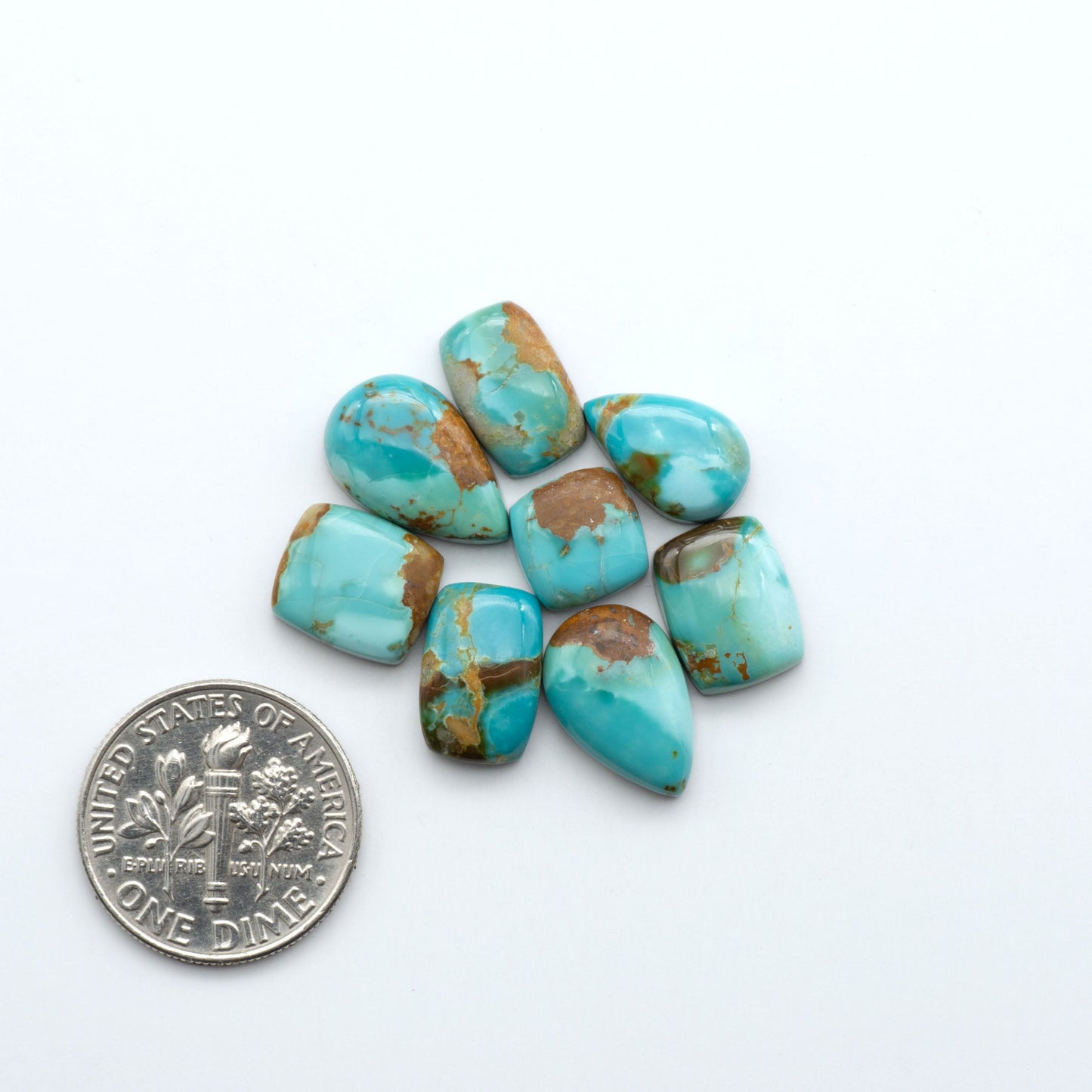 Add a touch of beauty to your collection with our stunning Pilot Mountain Turquoise Cabochons. Perfect for jewelry making each piece is truly one-of-a-kind.
