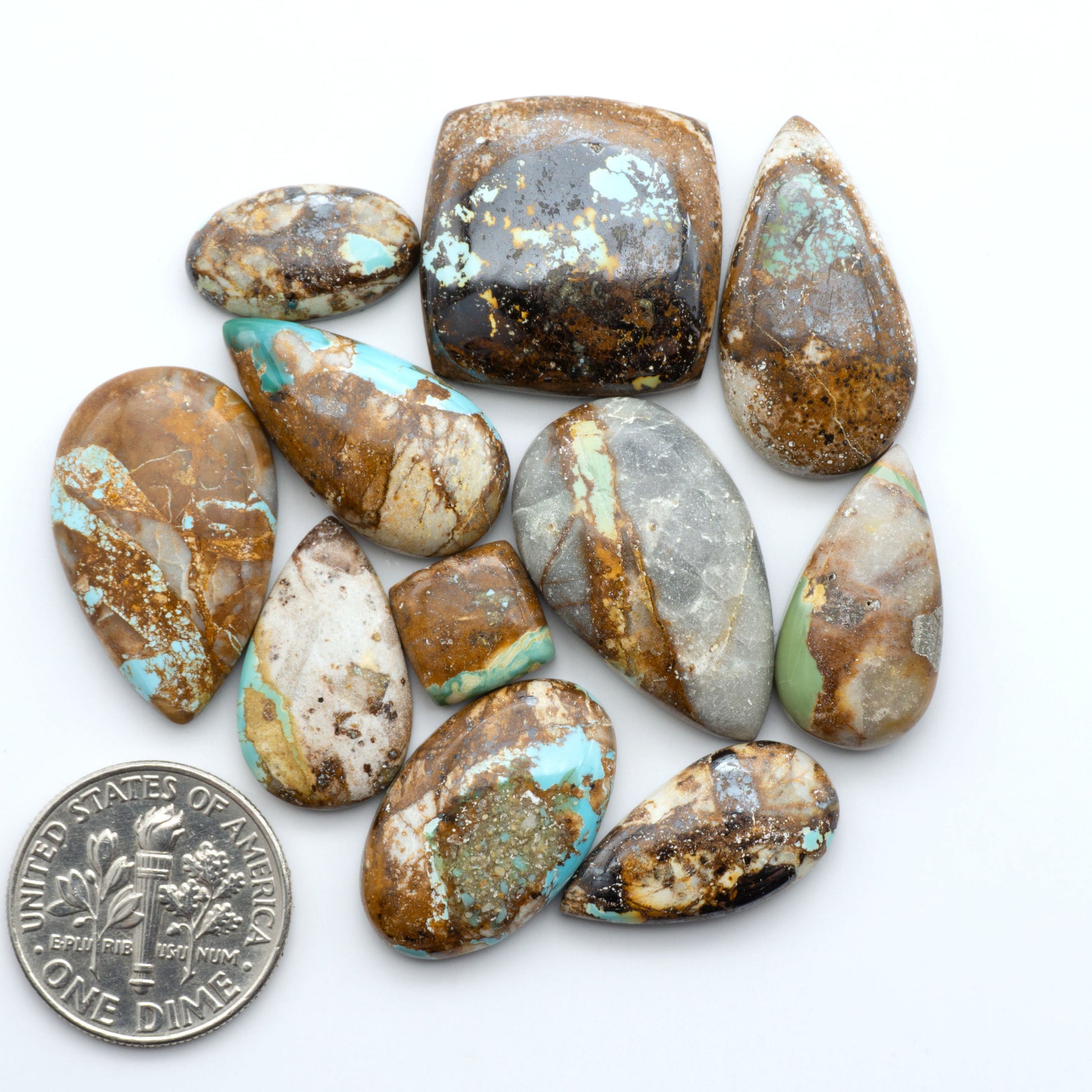 Royston Turquoise cabochons are famous for their distinctive matrix and unique green and blue hues, making them a favored option among jewelry designers.