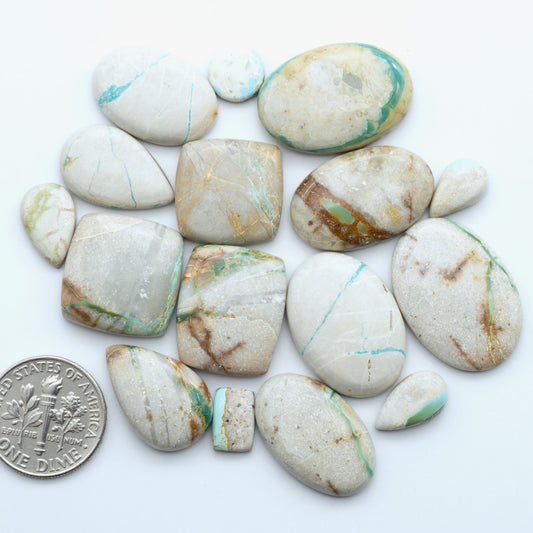Royston Turquoise cabochons are famous for their distinctive matrix and unique green and blue hues, making them a favored option among jewelry designers.