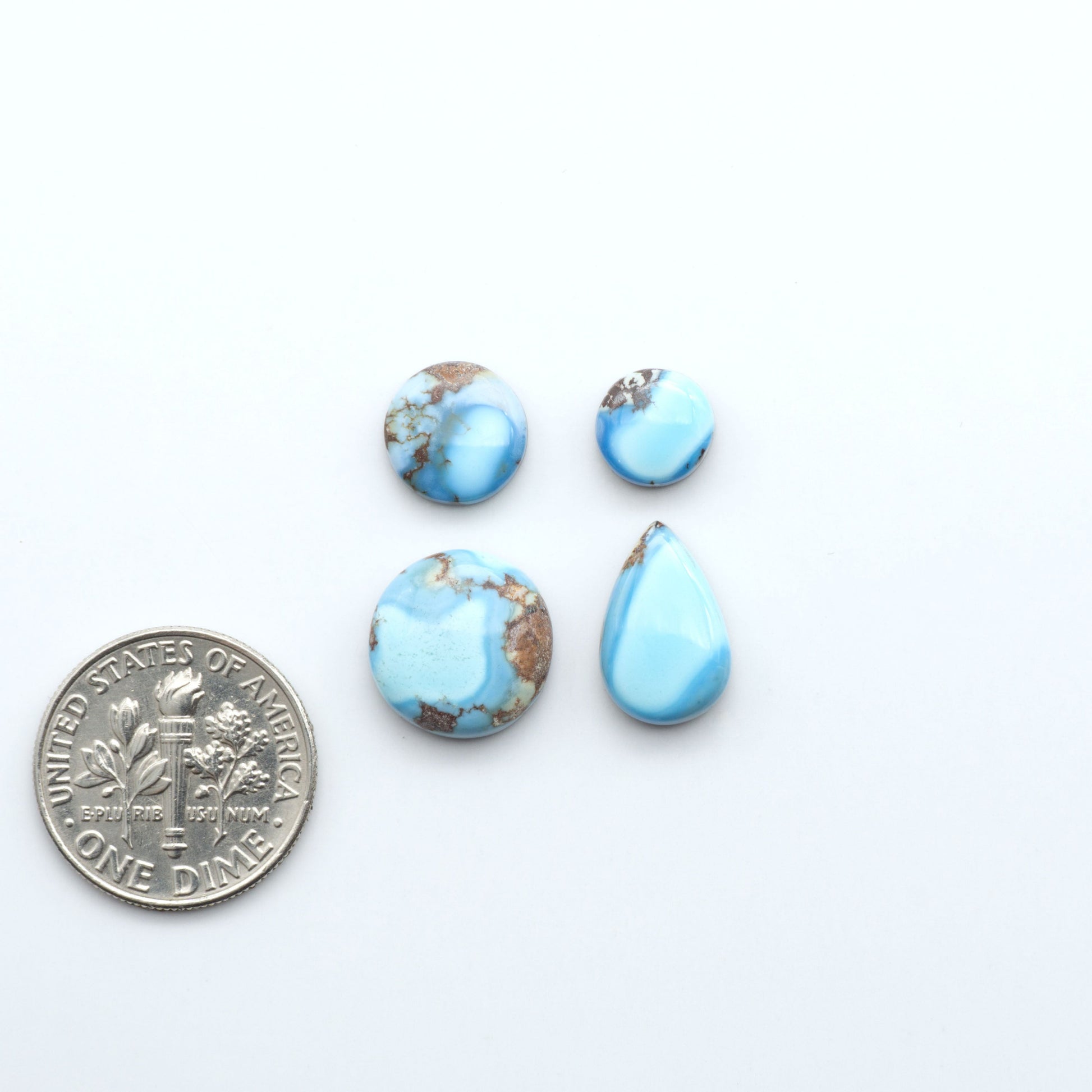 Discover the beauty of Natural Golden Hills Turquoise—prized for its icy blue tones, golden matrix, and exceptional quality. Ideal for artisan jewelry designs.