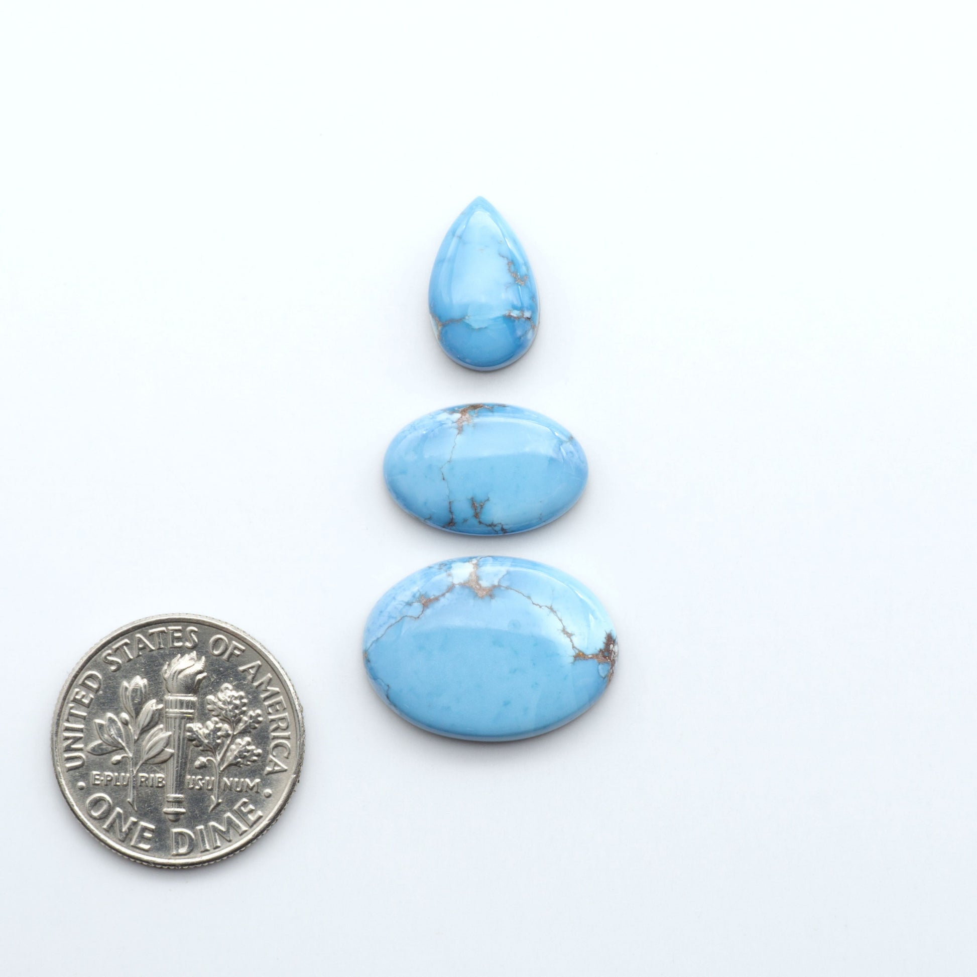 Discover the beauty of Natural Golden Hills Turquoise—prized for its icy blue tones, golden matrix, and exceptional quality. Ideal for artisan jewelry designs.