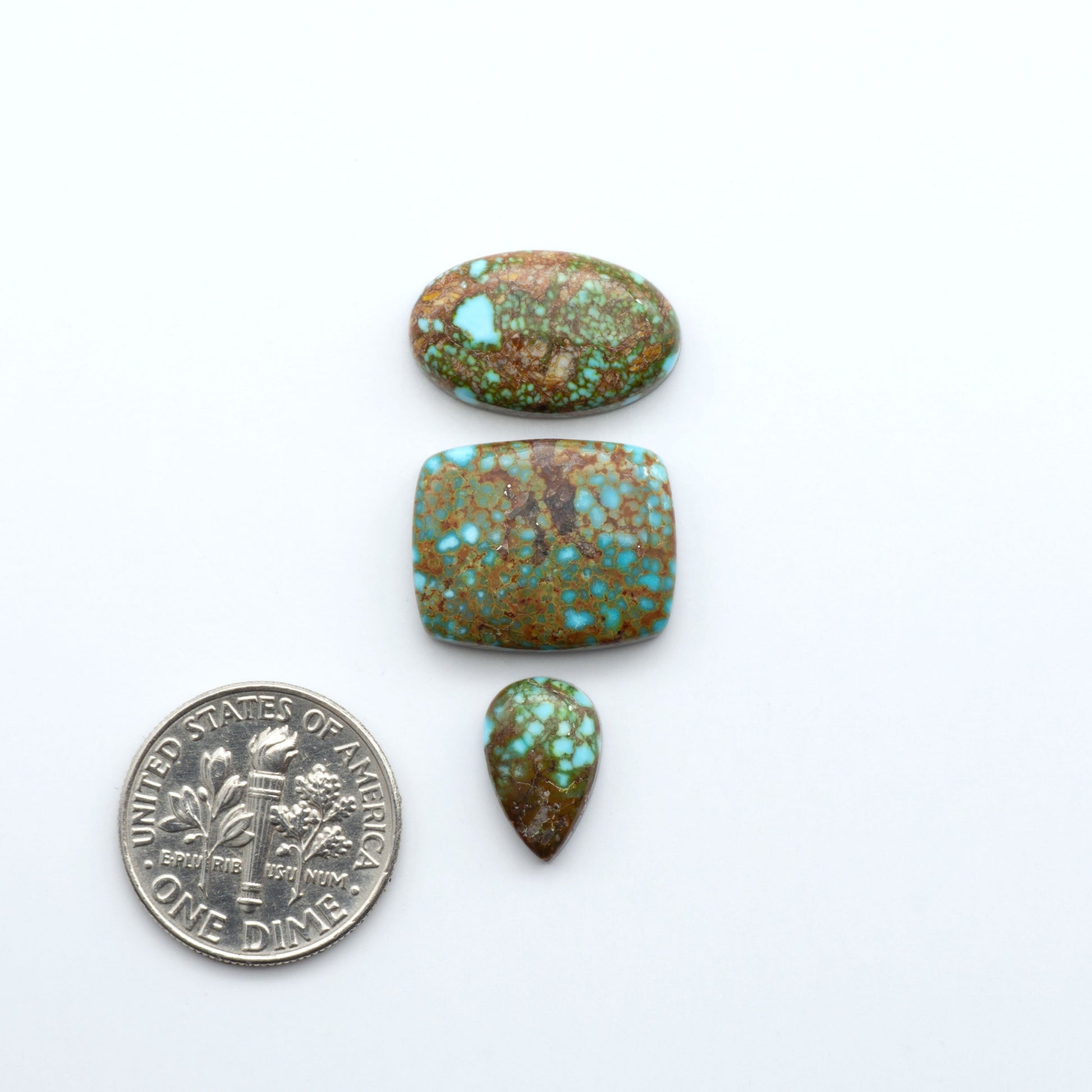 Kingman Turquoise Cabochons are a staple in the jewelry industry, known for their stunning blue-green color. Perfect for necklaces, earrings, and more!