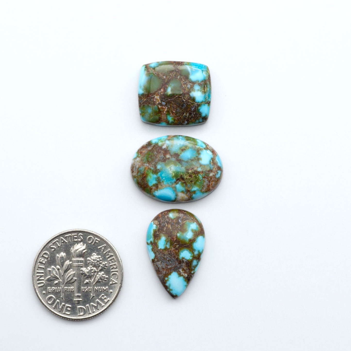 Kingman Turquoise Cabochons are a staple in the jewelry industry, known for their stunning blue-green color. Perfect for necklaces, earrings, and more!