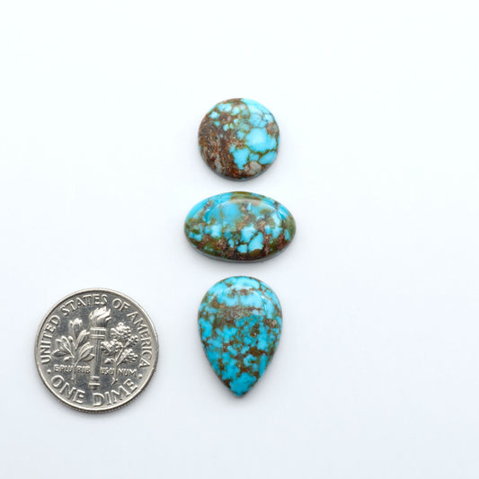 Kingman Turquoise Cabochons are a staple in the jewelry industry, known for their stunning blue-green color. Perfect for necklaces, earrings, and more!