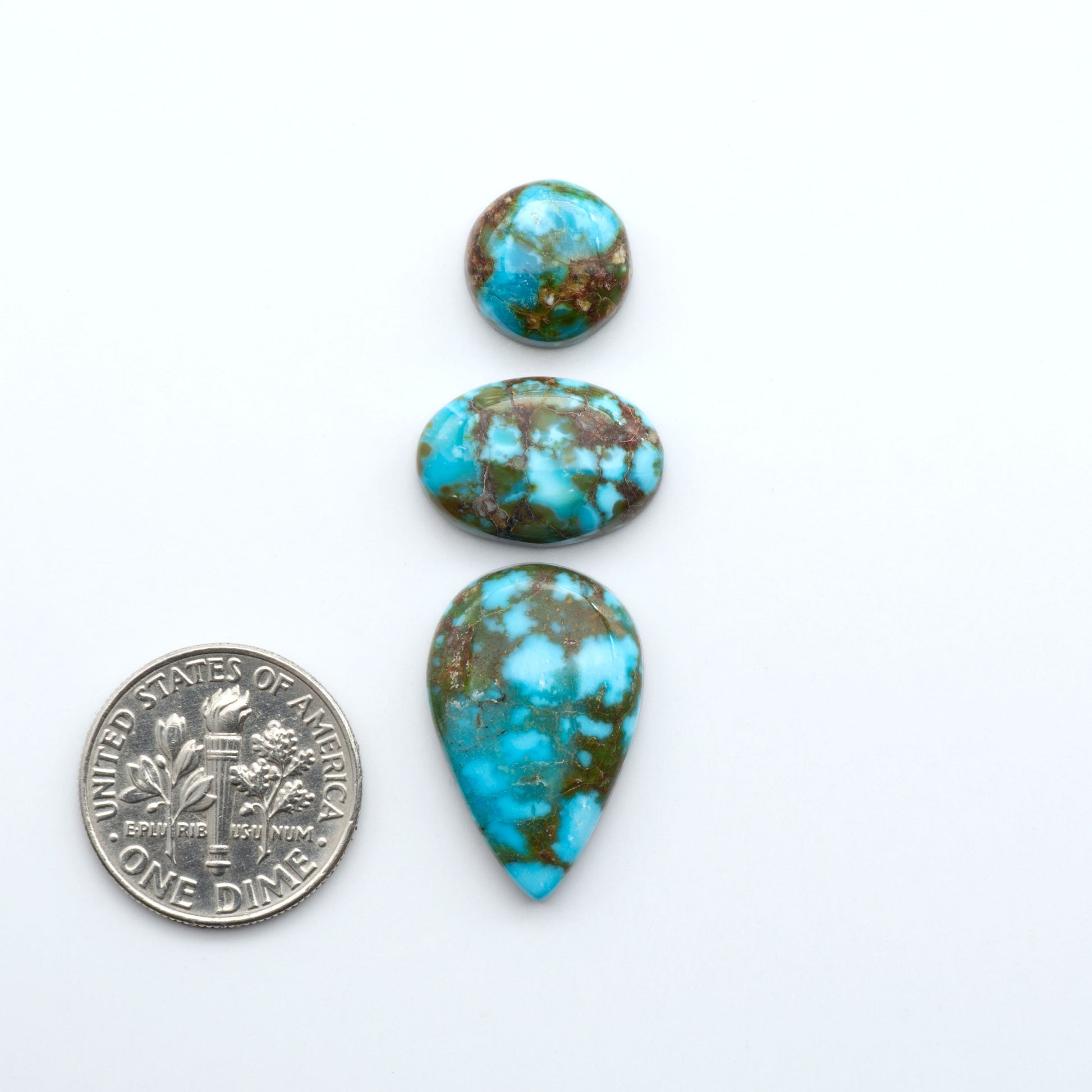 Kingman Turquoise Cabochons are a staple in the jewelry industry, known for their stunning blue-green color. Perfect for necklaces, earrings, and more!