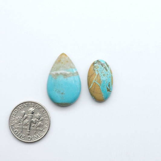 Add a touch of beauty to your collection with our stunning Pilot Mountain Turquoise Cabochons. Perfect for jewelry making each piece is truly one-of-a-kind.