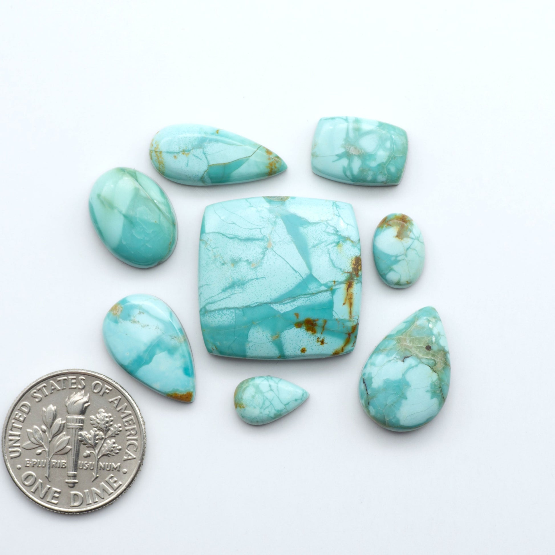 Add a touch of beauty to your collection with our stunning Pilot Mountain Turquoise Cabochons. Perfect for jewelry making each piece is truly one-of-a-kind.