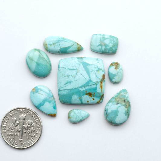 Add a touch of beauty to your collection with our stunning Pilot Mountain Turquoise Cabochons. Perfect for jewelry making each piece is truly one-of-a-kind.