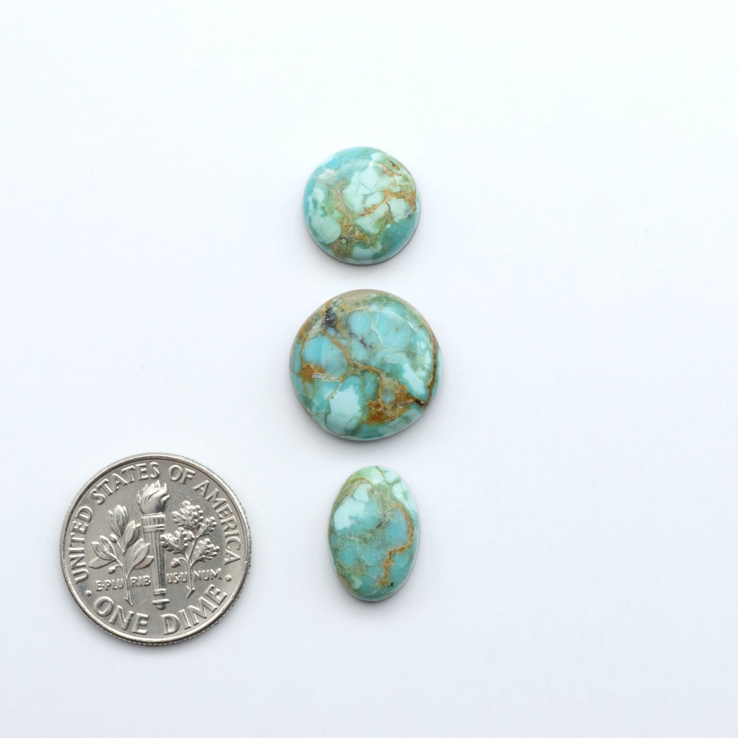 Add a touch of beauty to your collection with our stunning Pilot Mountain Turquoise Cabochons. Perfect for jewelry making each piece is truly one-of-a-kind.