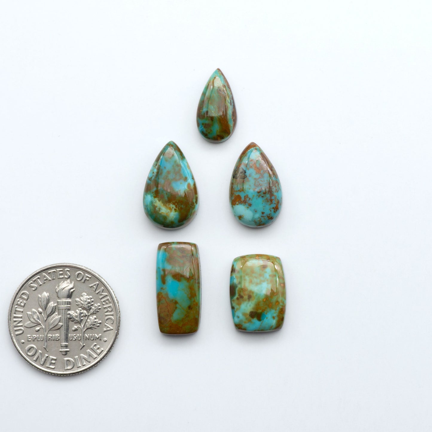 Add a touch of beauty to your collection with our stunning Pilot Mountain Turquoise Cabochons. Perfect for jewelry making each piece is truly one-of-a-kind.
