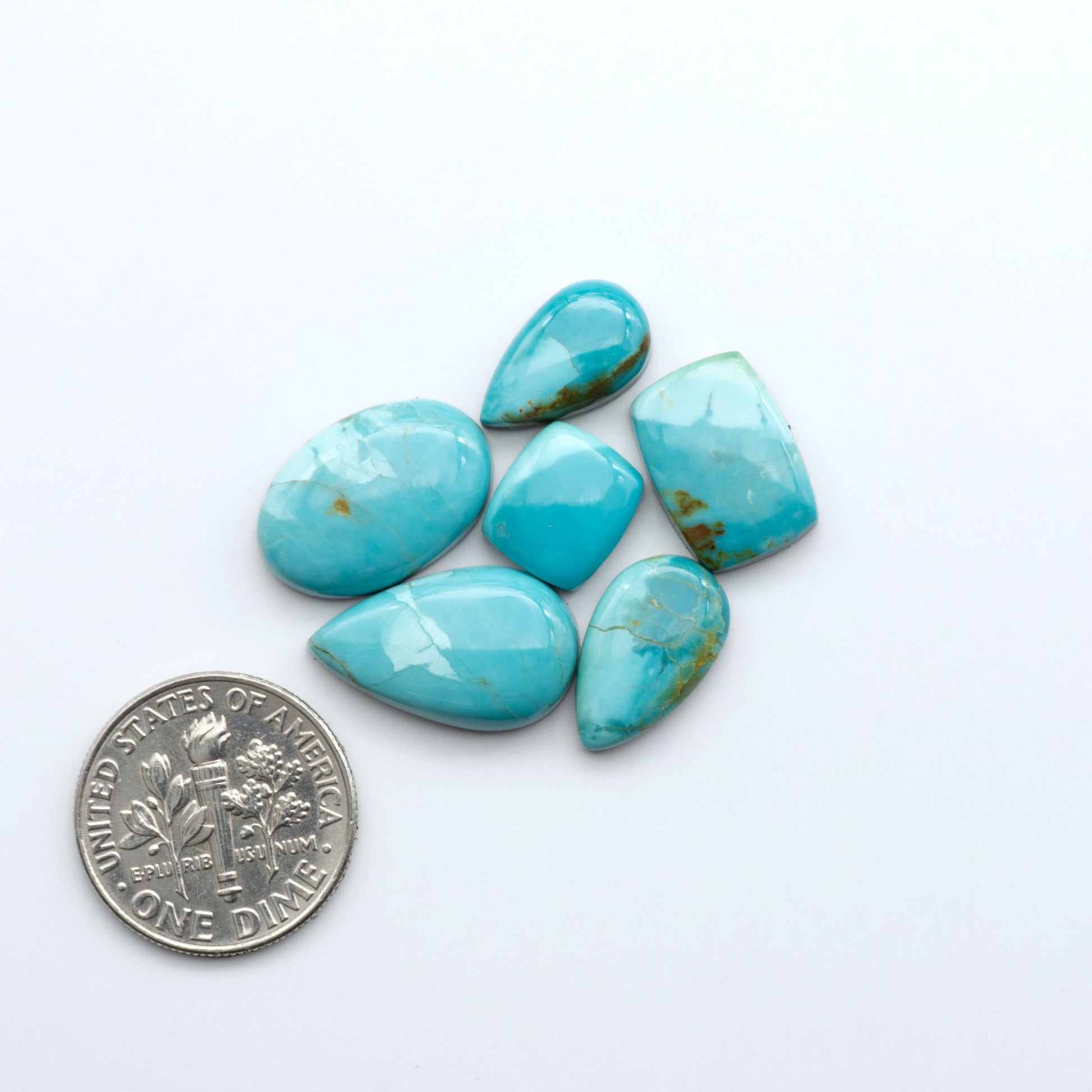 Add a touch of beauty to your collection with our stunning Pilot Mountain Turquoise Cabochons. Perfect for jewelry making each piece is truly one-of-a-kind.