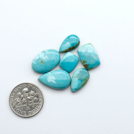 Add a touch of beauty to your collection with our stunning Pilot Mountain Turquoise Cabochons. Perfect for jewelry making each piece is truly one-of-a-kind.