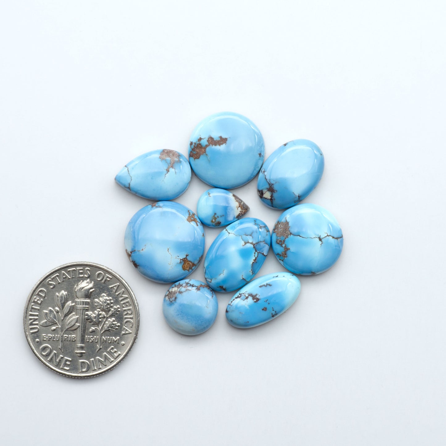 Discover the beauty of Natural Golden Hills Turquoise—prized for its icy blue tones, golden matrix, and exceptional quality. Ideal for artisan jewelry designs.