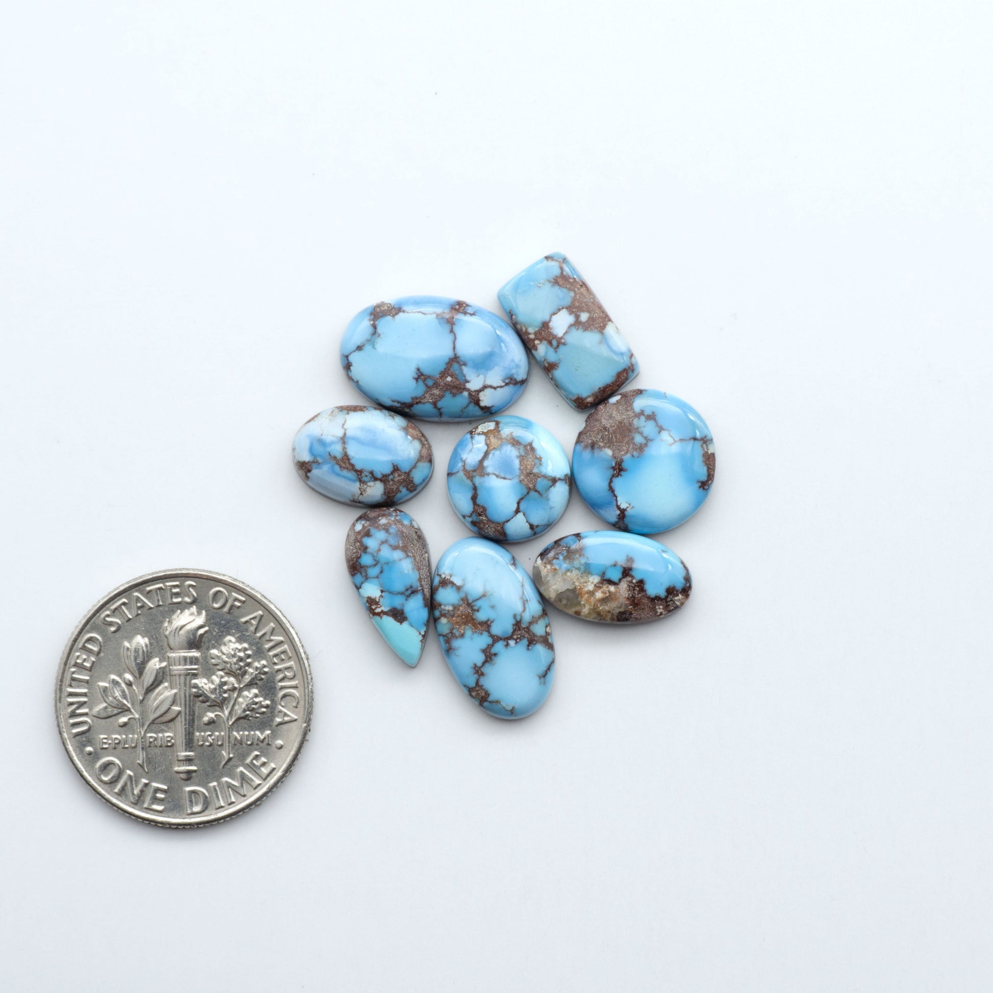 Discover the beauty of Natural Golden Hills Turquoise—prized for its icy blue tones, golden matrix, and exceptional quality. Ideal for artisan jewelry designs.