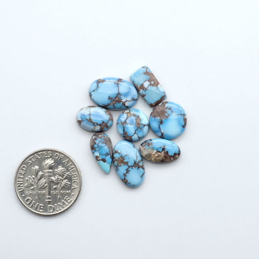 Discover the beauty of Natural Golden Hills Turquoise—prized for its icy blue tones, golden matrix, and exceptional quality. Ideal for artisan jewelry designs.