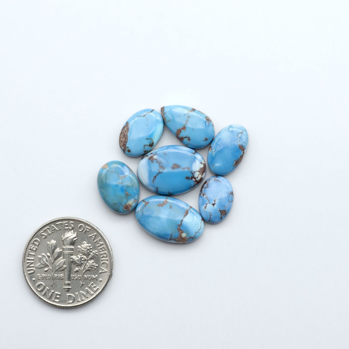 Discover the beauty of Natural Golden Hills Turquoise—prized for its icy blue tones, golden matrix, and exceptional quality. Ideal for artisan jewelry designs.