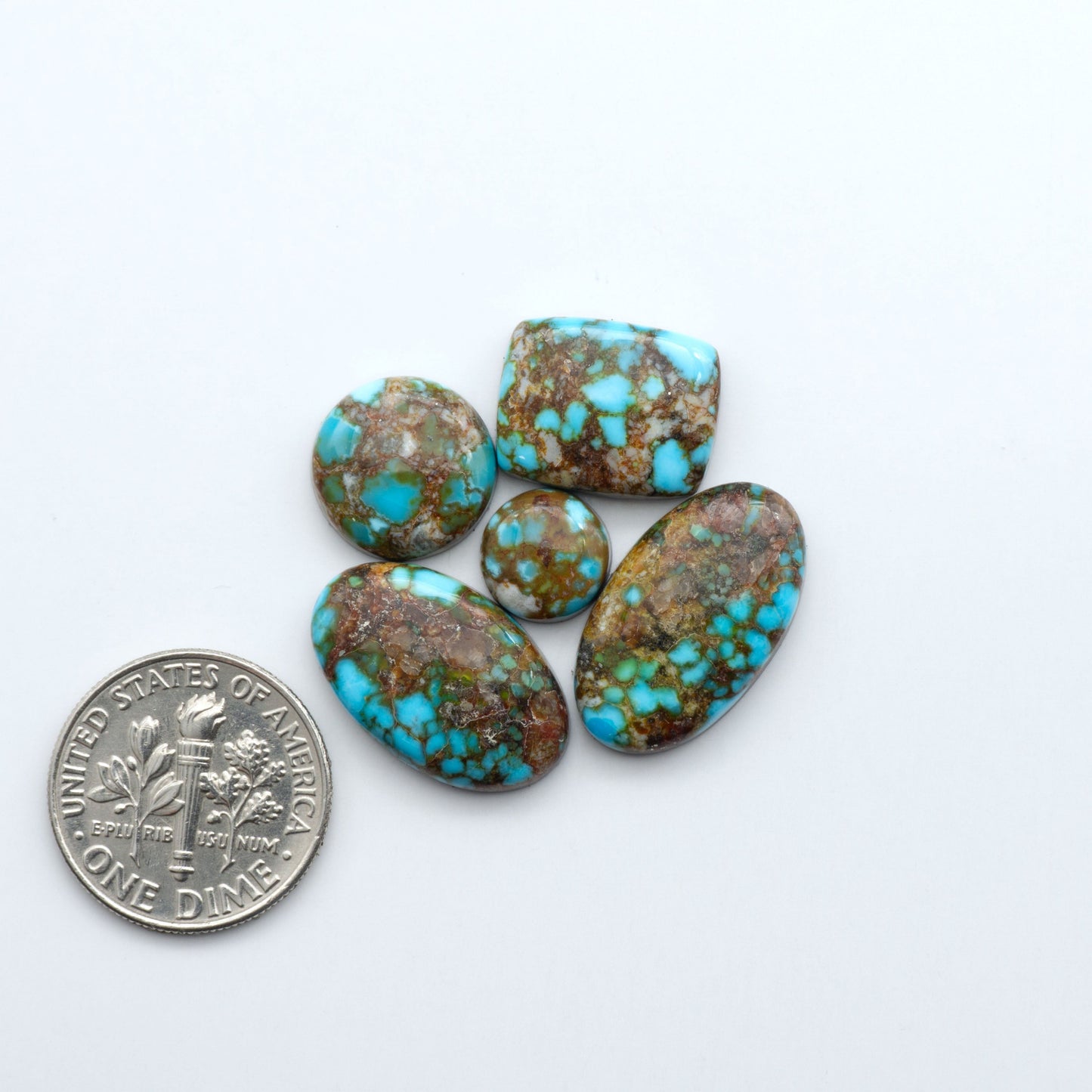 Discover the beauty of Natural Golden Hills Turquoise—prized for its icy blue tones, golden matrix, and exceptional quality. Ideal for artisan jewelry designs.