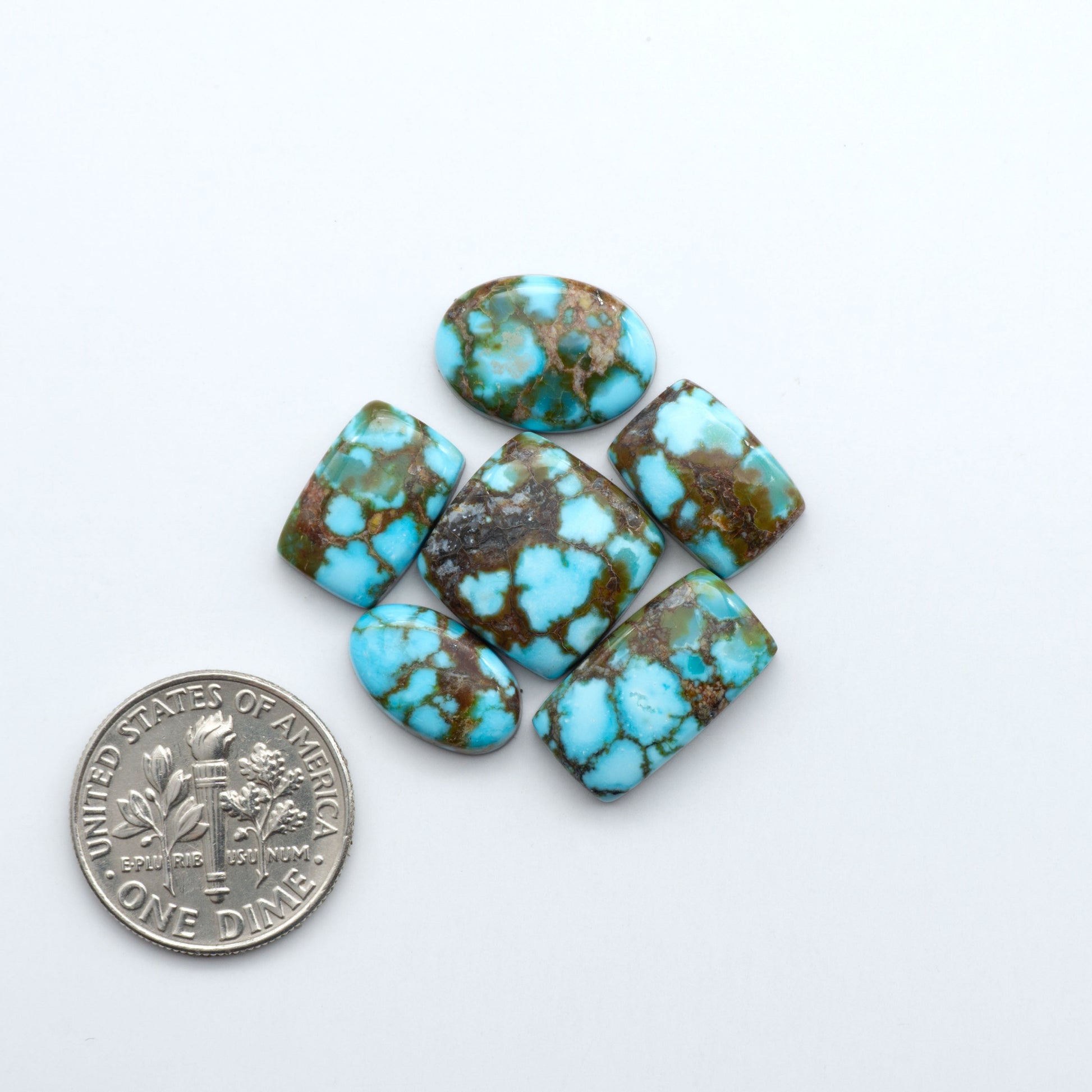 Discover the beauty of Natural Golden Hills Turquoise—prized for its icy blue tones, golden matrix, and exceptional quality. Ideal for artisan jewelry designs.