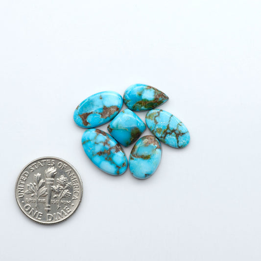 Discover the beauty of Natural Golden Hills Turquoise—prized for its icy blue tones, golden matrix, and exceptional quality. Ideal for artisan jewelry designs.