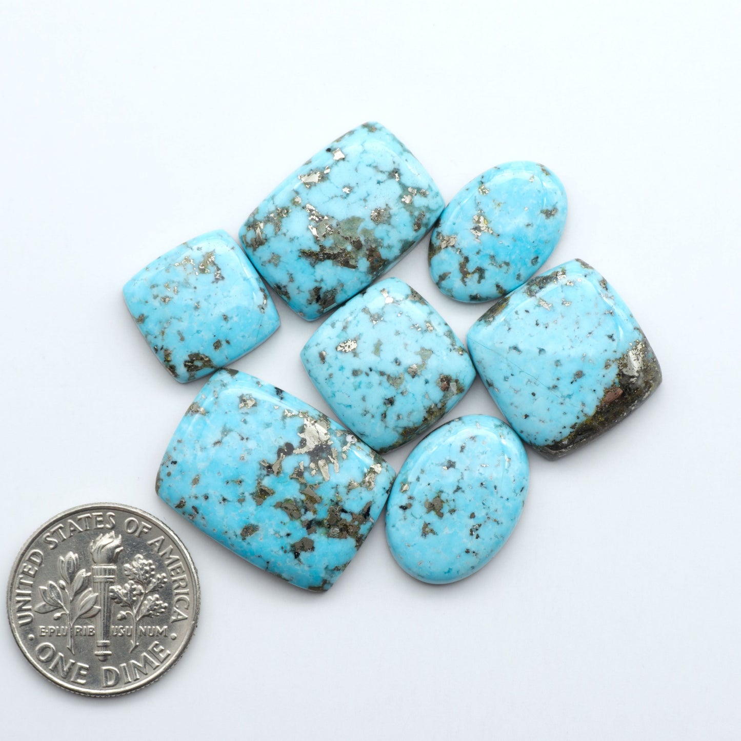 Discover the beauty of Natural Golden Hills Turquoise—prized for its icy blue tones, golden matrix, and exceptional quality. Ideal for artisan jewelry designs.