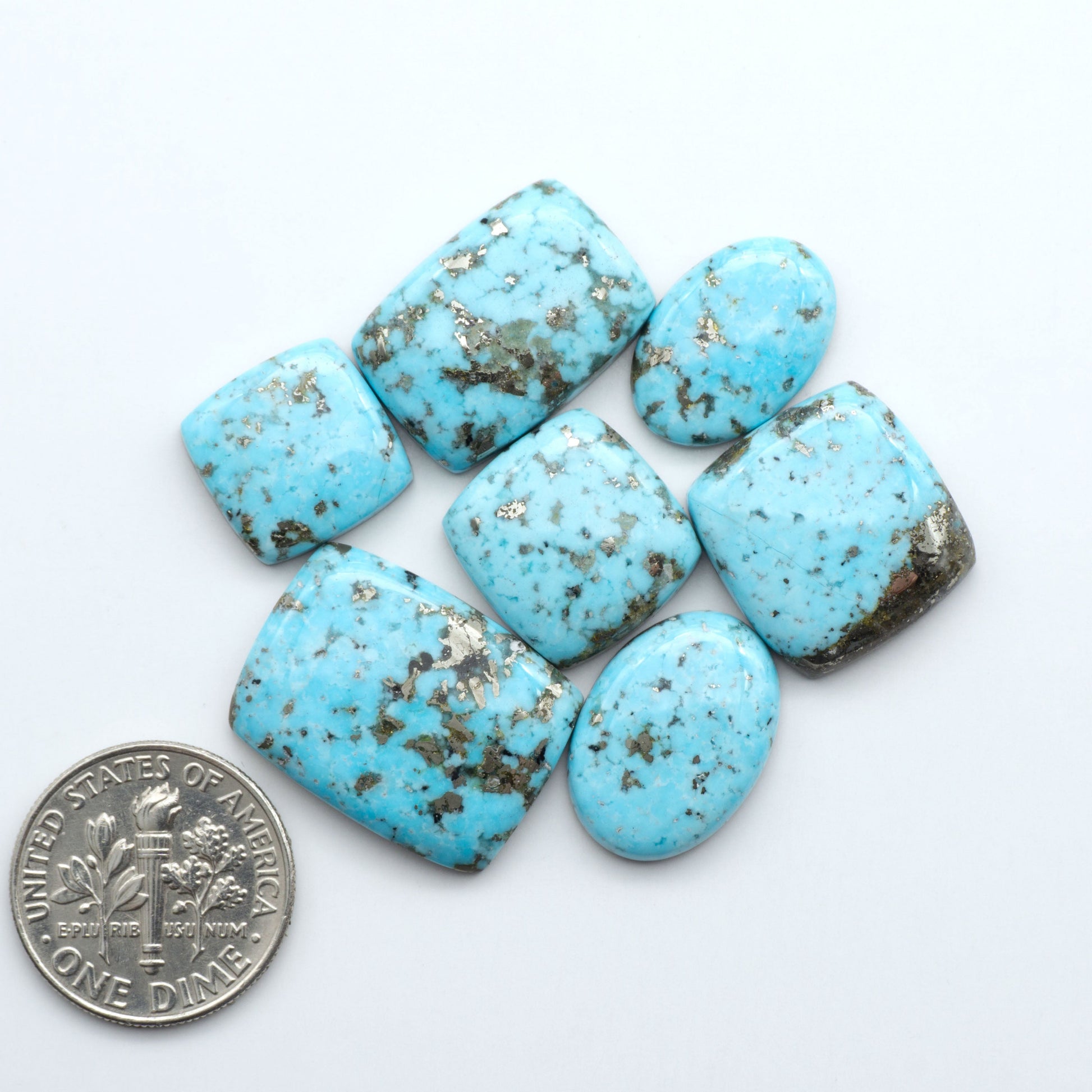 Discover the beauty of Natural Golden Hills Turquoise—prized for its icy blue tones, golden matrix, and exceptional quality. Ideal for artisan jewelry designs.