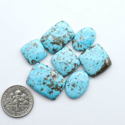 Discover the beauty of Natural Golden Hills Turquoise—prized for its icy blue tones, golden matrix, and exceptional quality. Ideal for artisan jewelry designs.