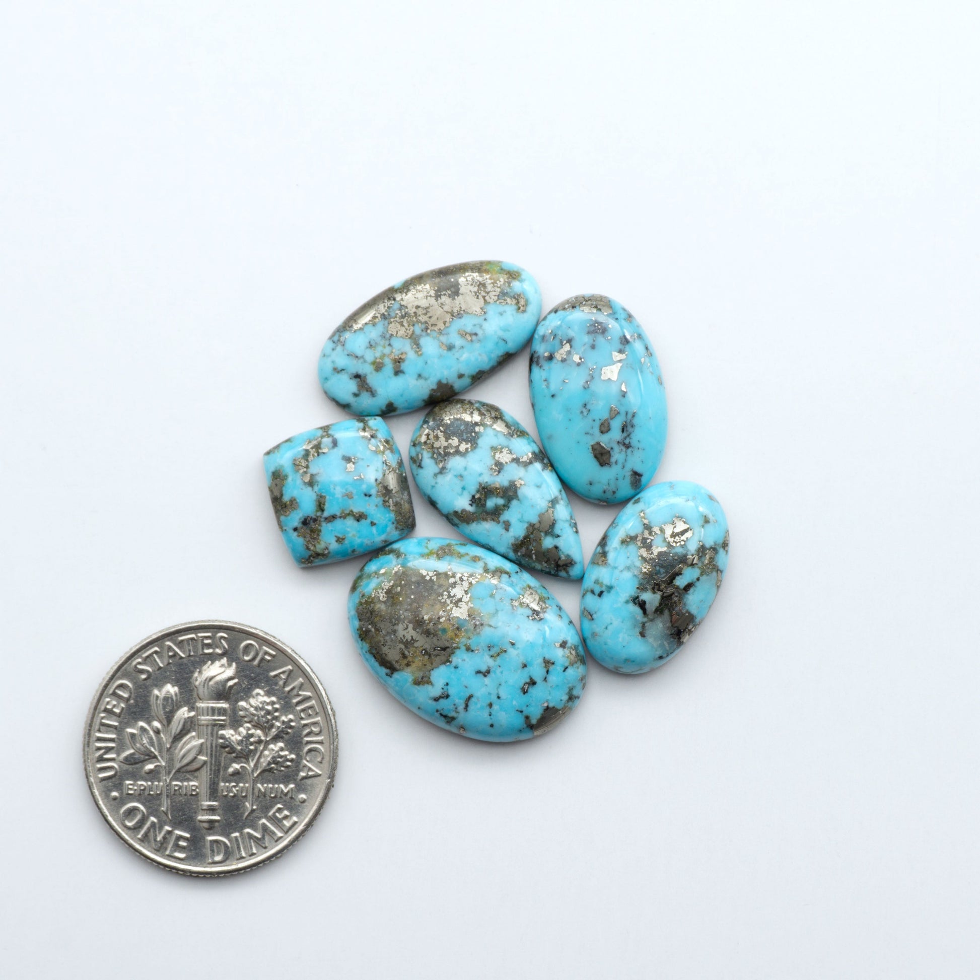 Discover the beauty of Natural Golden Hills Turquoise—prized for its icy blue tones, golden matrix, and exceptional quality. Ideal for artisan jewelry designs.