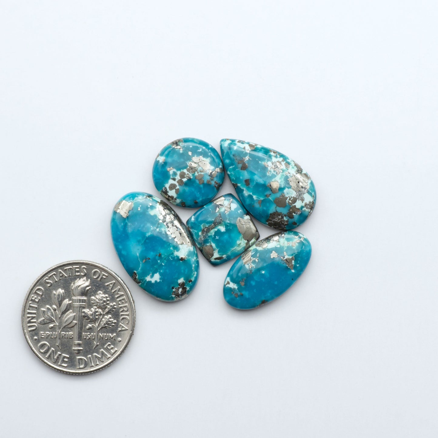 Discover the beauty of Natural Golden Hills Turquoise—prized for its icy blue tones, golden matrix, and exceptional quality. Ideal for artisan jewelry designs.