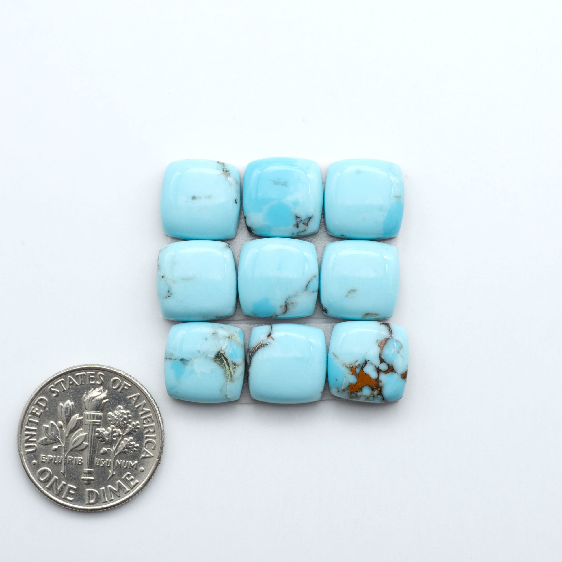 Enhance your jewelry designs with Pressed Turquoise Nugget Cabochons. Crafted from composite materials they add a captivating touch to your creations.