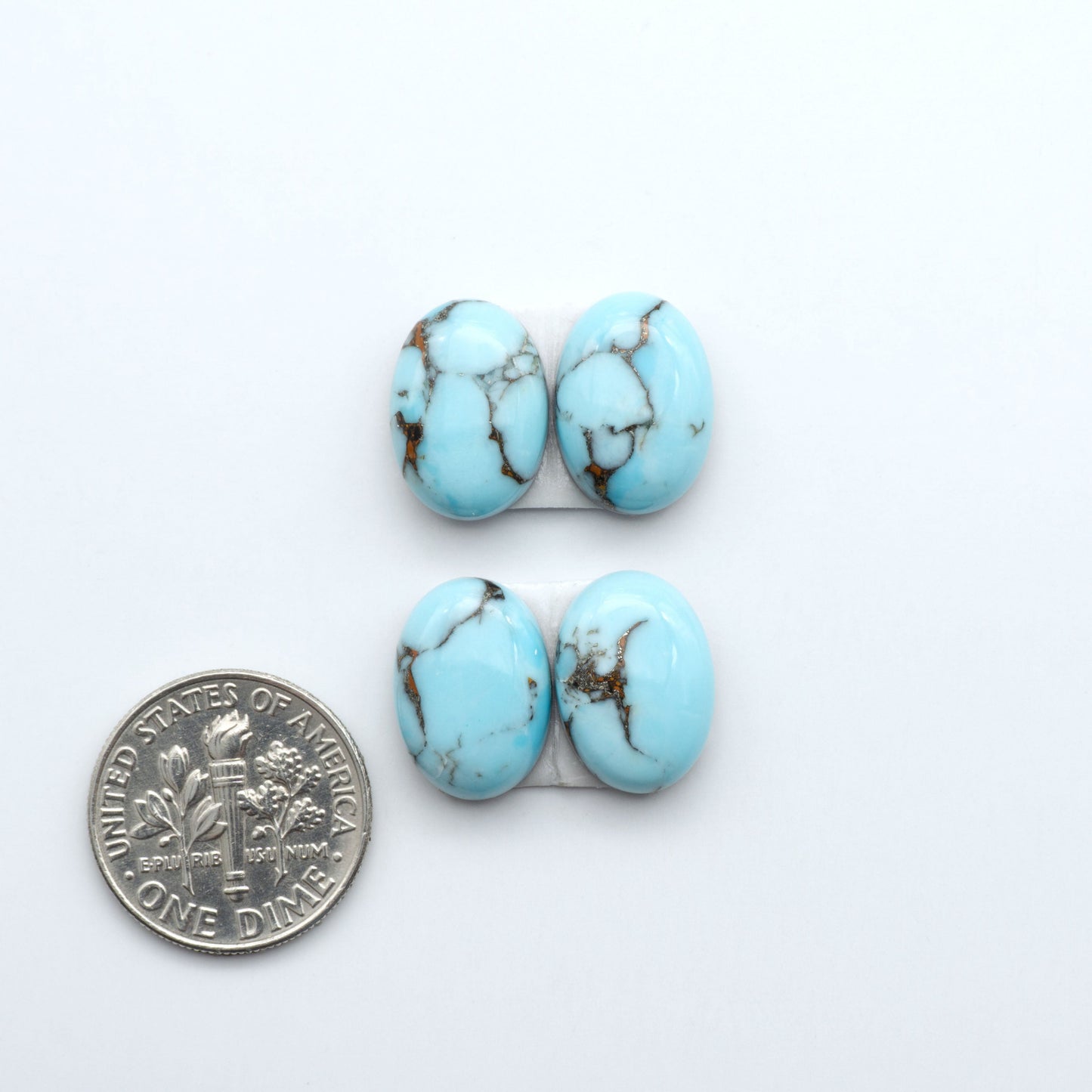 Enhance your jewelry designs with Pressed Turquoise Nugget Cabochons. Crafted from composite materials they add a captivating touch to your creations.