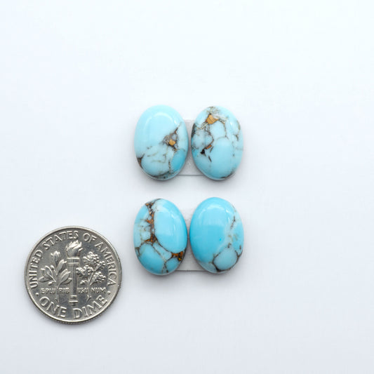 Enhance your jewelry designs with Pressed Turquoise Nugget Cabochons. Crafted from composite materials they add a captivating touch to your creations.