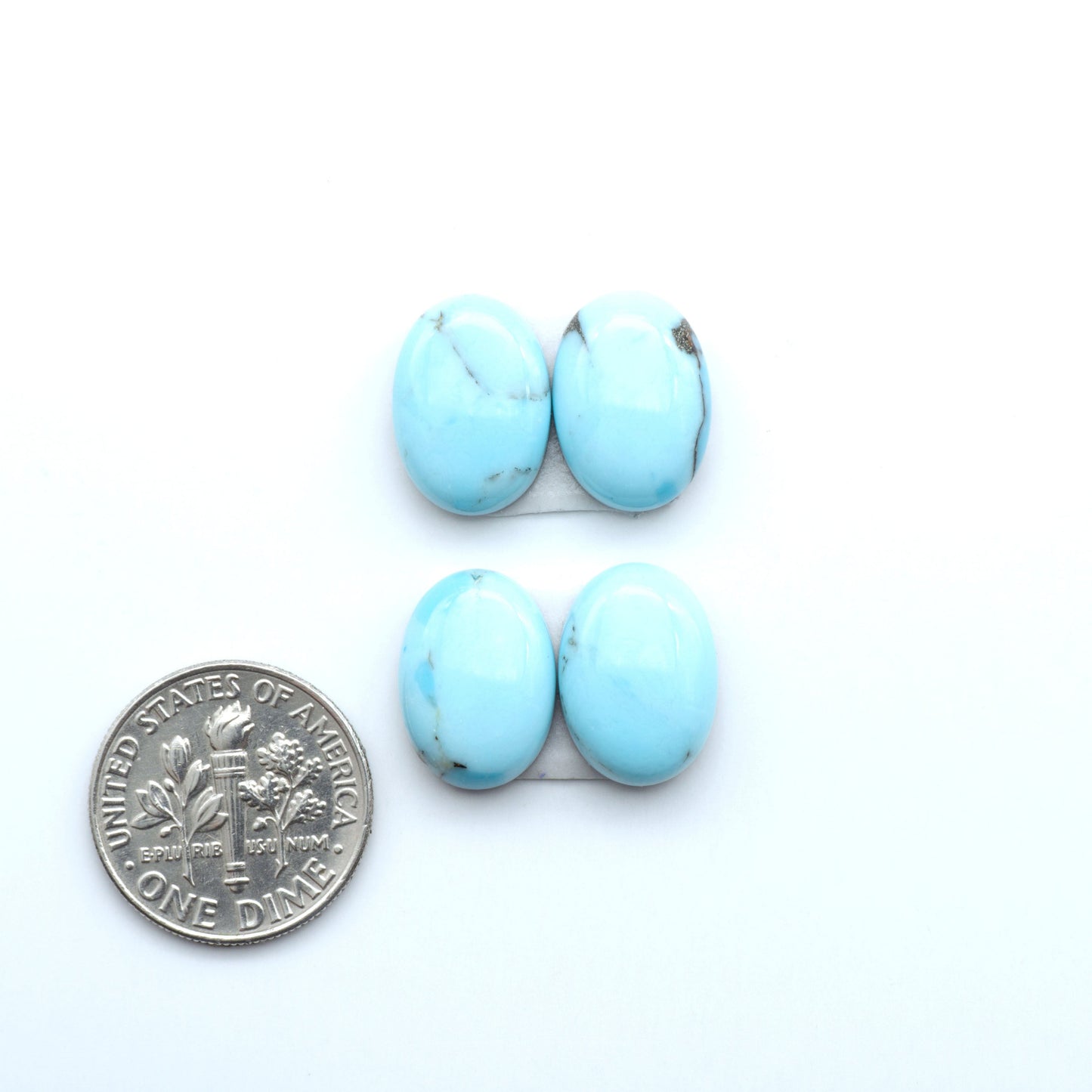 Enhance your jewelry designs with Pressed Turquoise Nugget Cabochons. Crafted from composite materials they add a captivating touch to your creations.