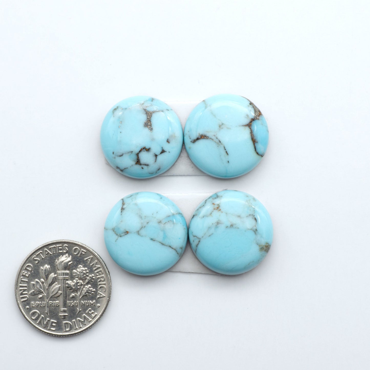 Enhance your jewelry designs with Pressed Turquoise Nugget Cabochons. Crafted from composite materials they add a captivating touch to your creations.