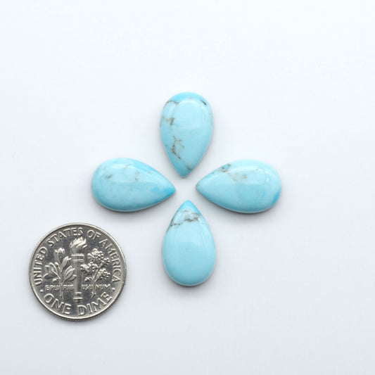 Enhance your jewelry designs with Pressed Turquoise Nugget Cabochons. Crafted from composite materials they add a captivating touch to your creations.