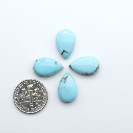 Enhance your jewelry designs with Pressed Turquoise Nugget Cabochons. Crafted from composite materials they add a captivating touch to your creations.