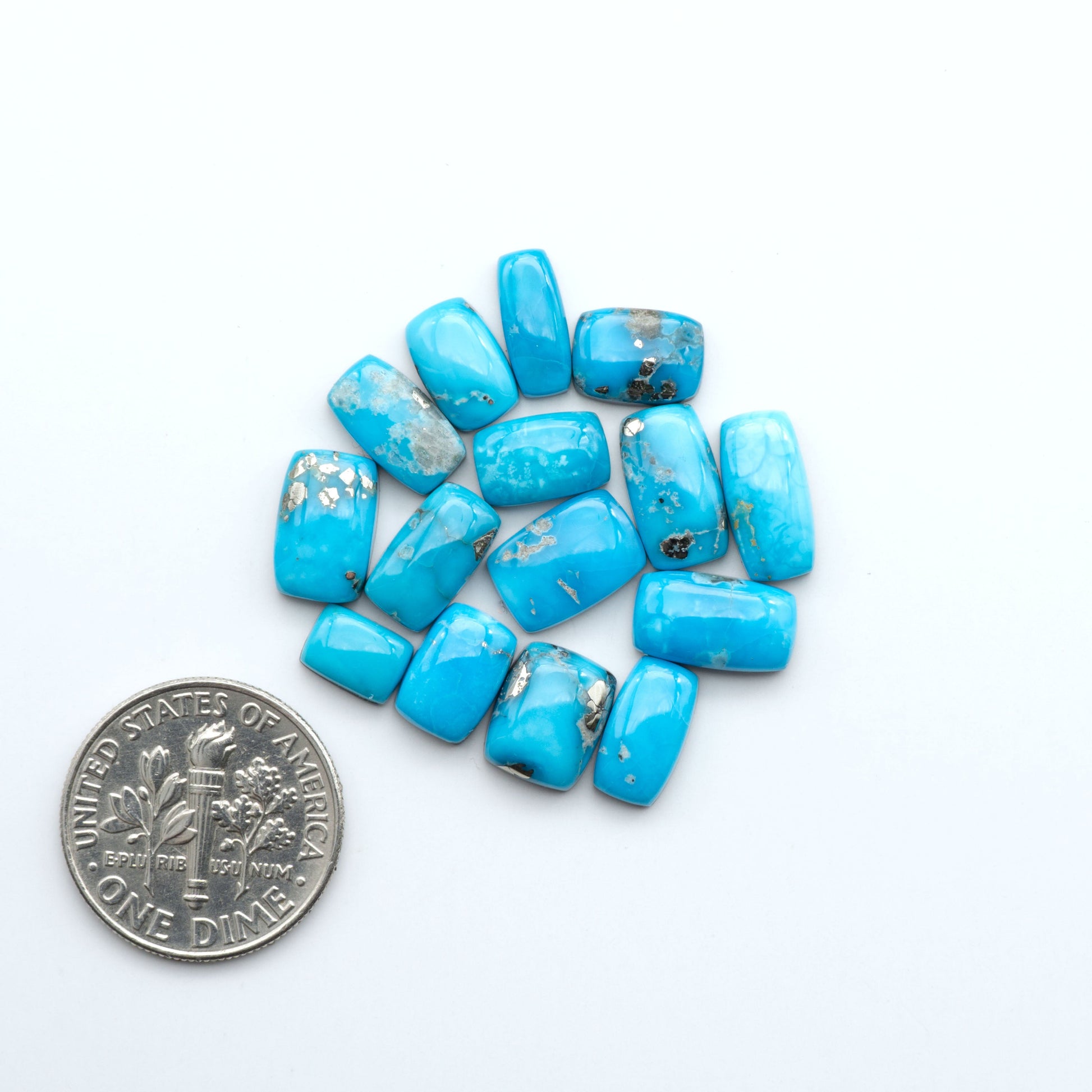 Create stunning handcrafted jewelry with Blue Bird Turquoise Cabochons. Their rich blue color and polish make them perfect for silversmiths and jewelry makers.