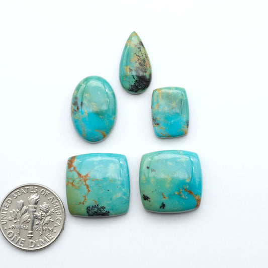 Experience the beauty of Turquoise Mountain Cabochons. With their distinctive blue and green color, these gemstones are perfect for any jewelry piece.