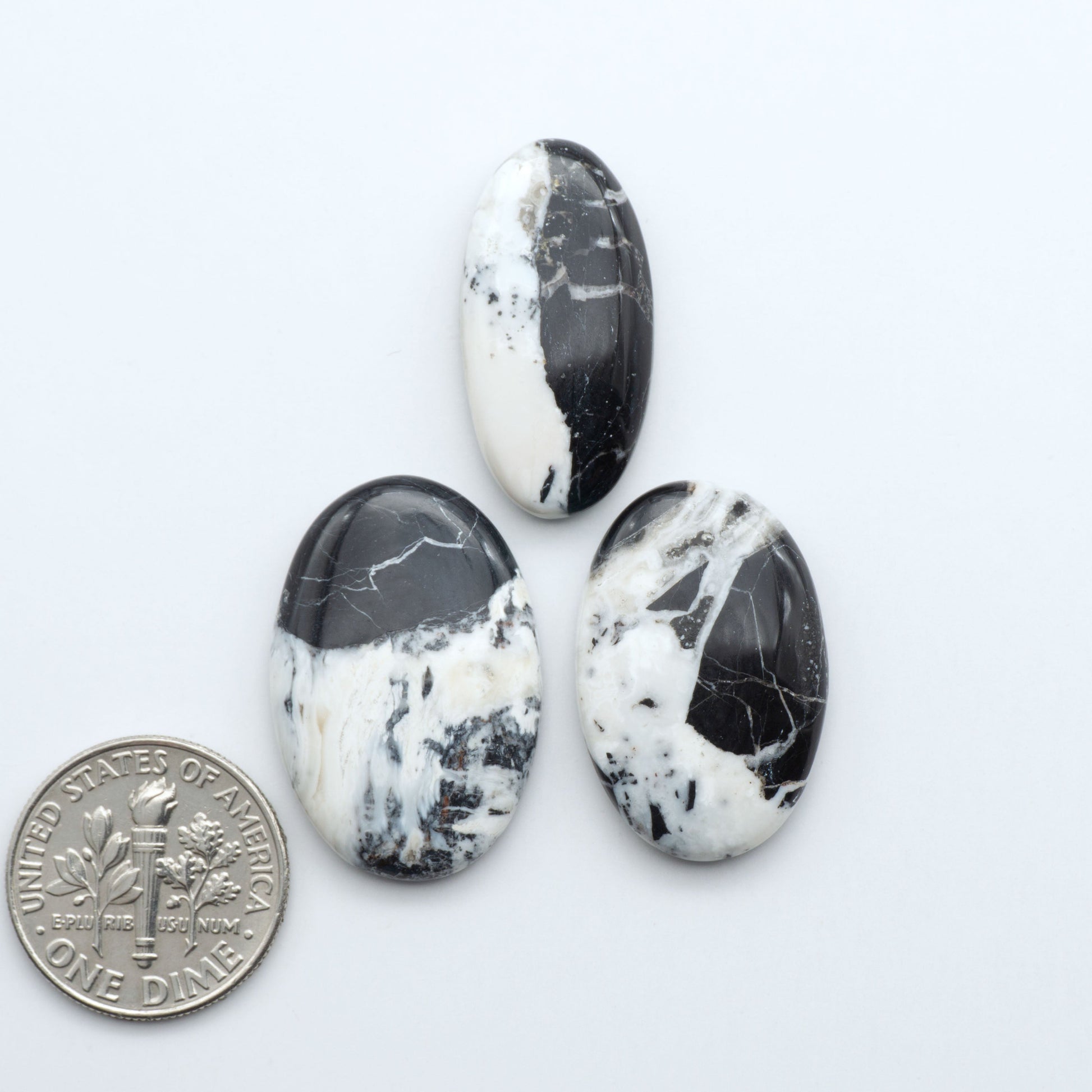 Natural White Buffalo Stone Cabochons are semi-precious gemstones cut into shapes ideal for jewelry-making, making them an excellent choice for artisans.

