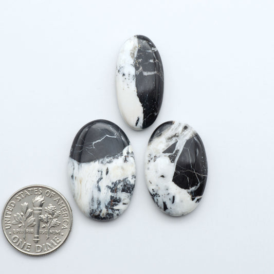 Natural White Buffalo Stone Cabochons are semi-precious gemstones cut into shapes ideal for jewelry-making, making them an excellent choice for artisans.

