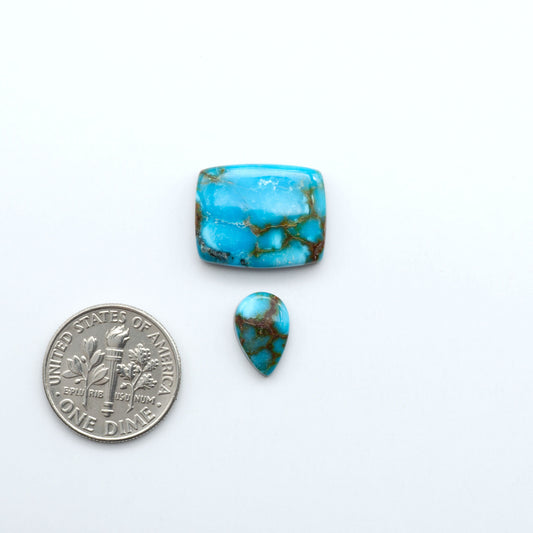 Kingman Turquoise Cabochons are a staple in the jewelry industry, known for their stunning blue-green color. Perfect for necklaces, earrings, and more!