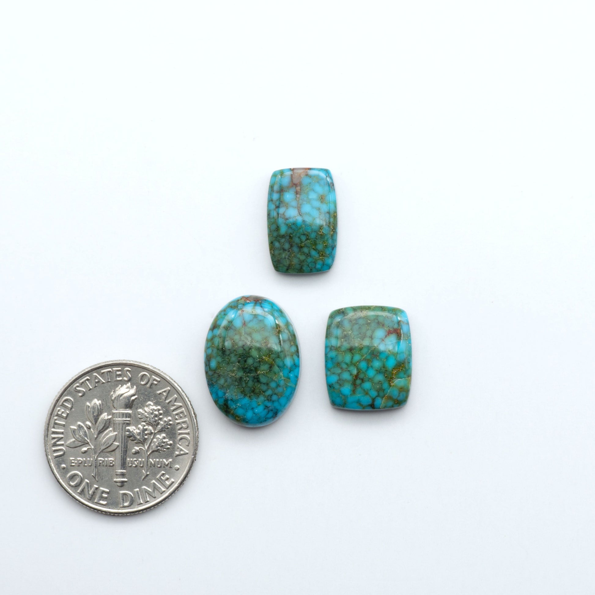 Kingman Turquoise Cabochons are a staple in the jewelry industry, known for their stunning blue-green color. Perfect for necklaces, earrings, and more!