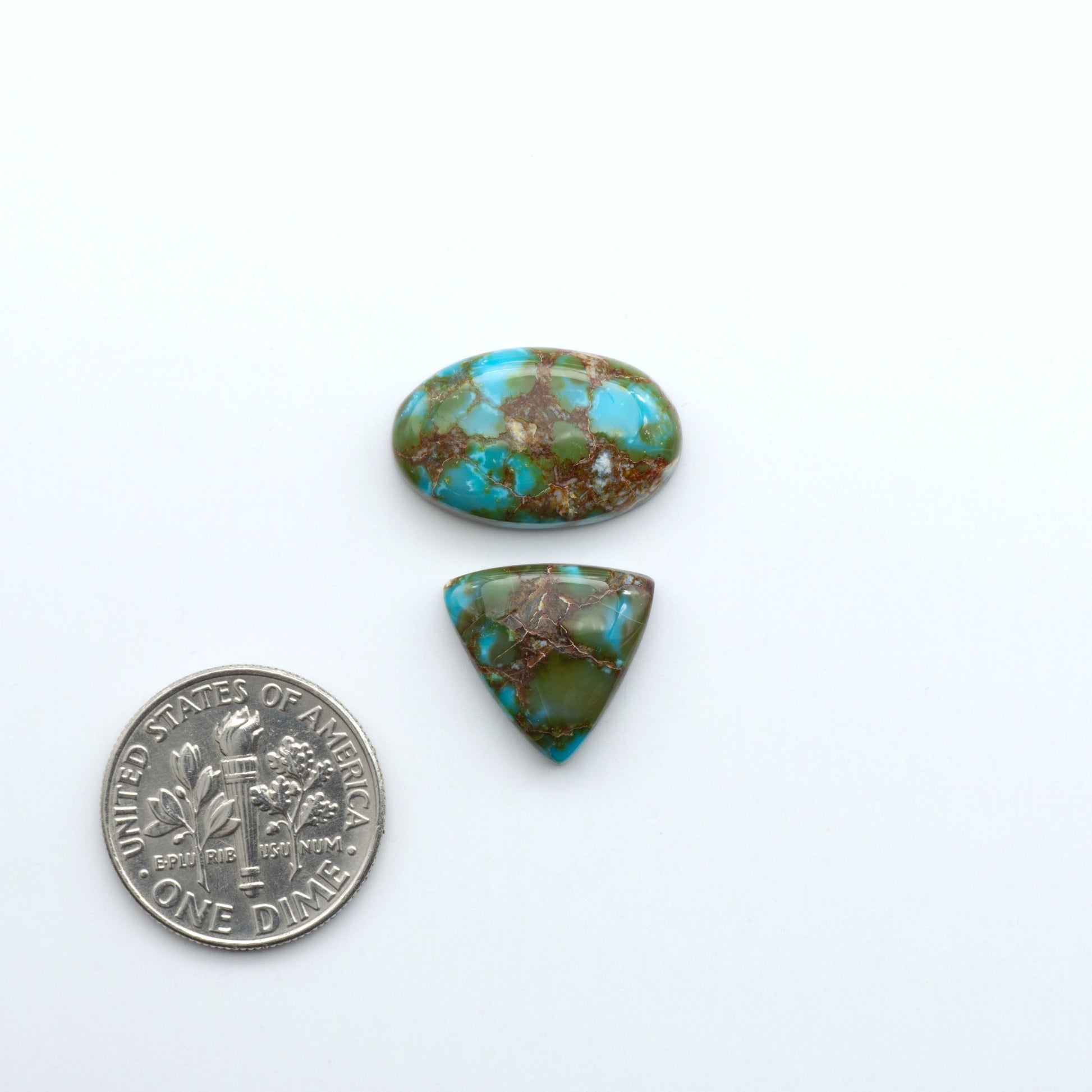 Kingman Turquoise Cabochons are a staple in the jewelry industry, known for their stunning blue-green color. Perfect for necklaces, earrings, and more!