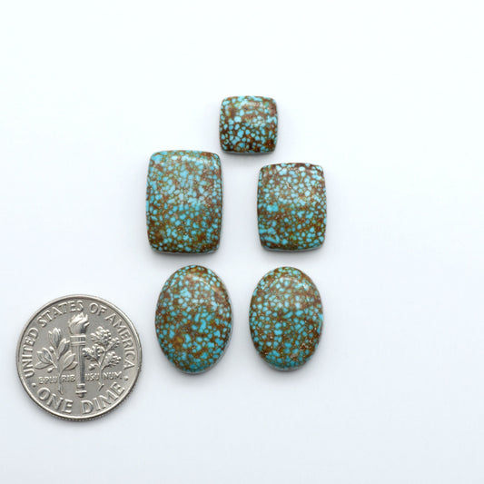 Kingman Turquoise Cabochons are a staple in the jewelry industry, known for their stunning blue-green color. Perfect for necklaces, earrings, and more!